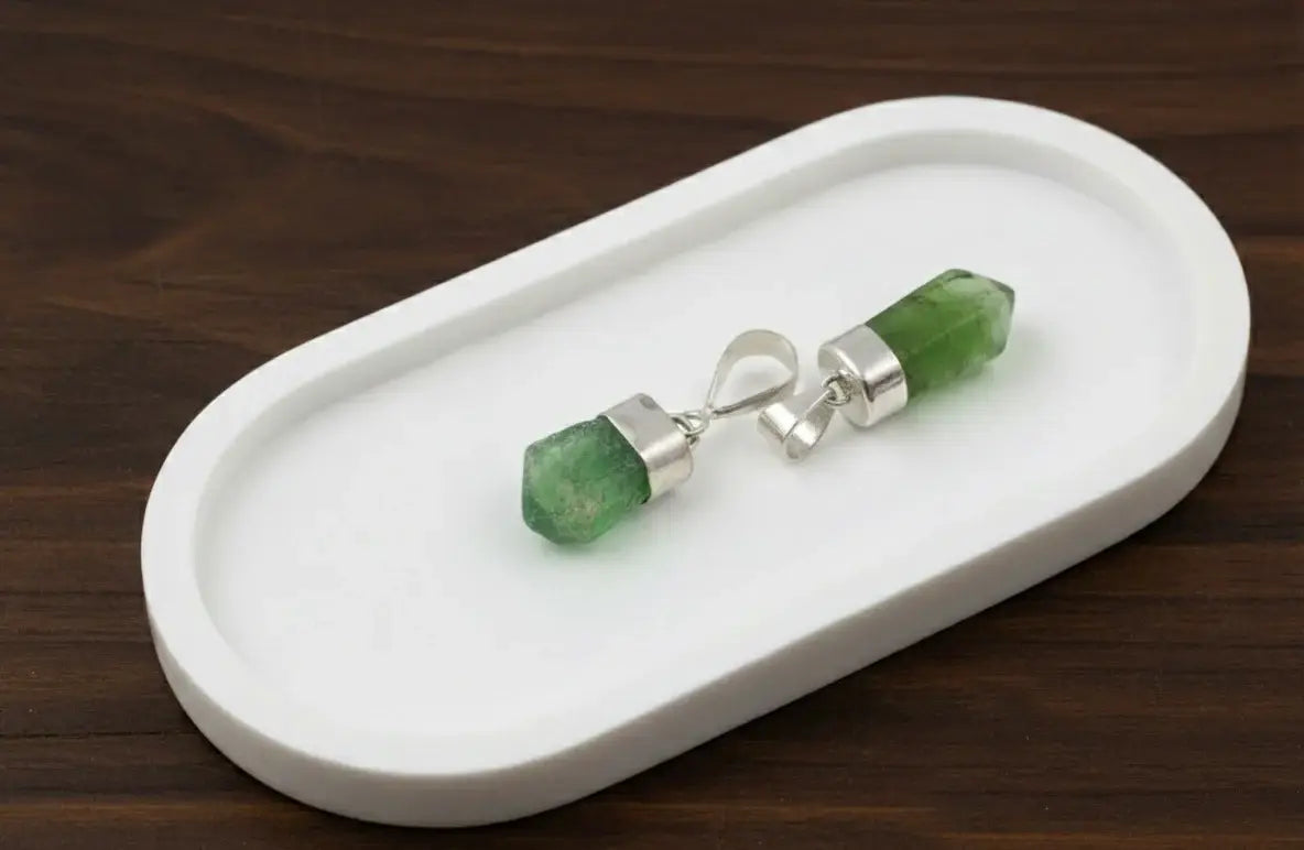Colgante con punta de olivino