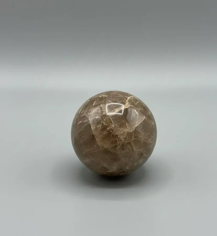 Esfera de piedra sol negra