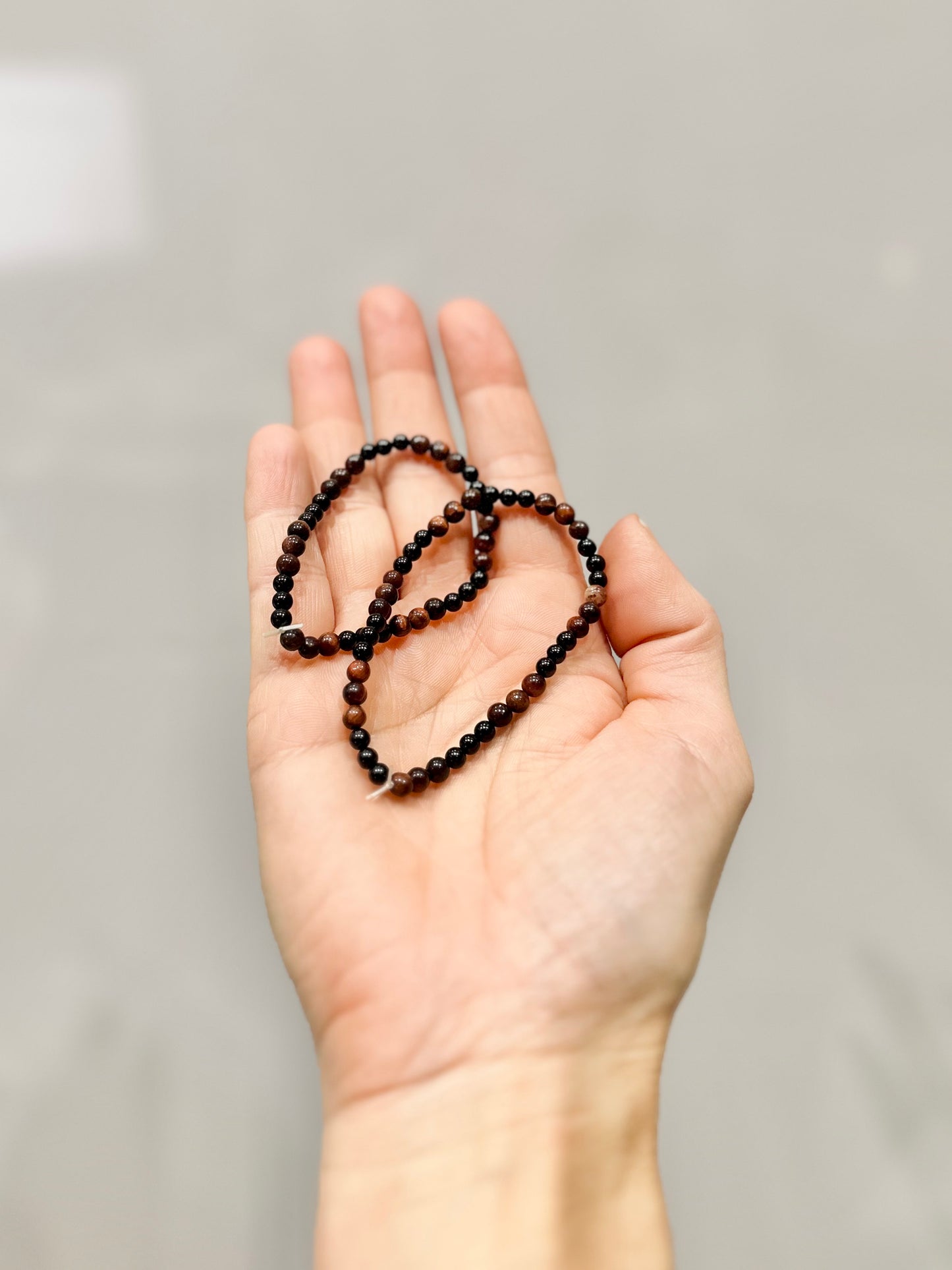 Pulsera de bolas de Turmalina negra y Ojo de Toro