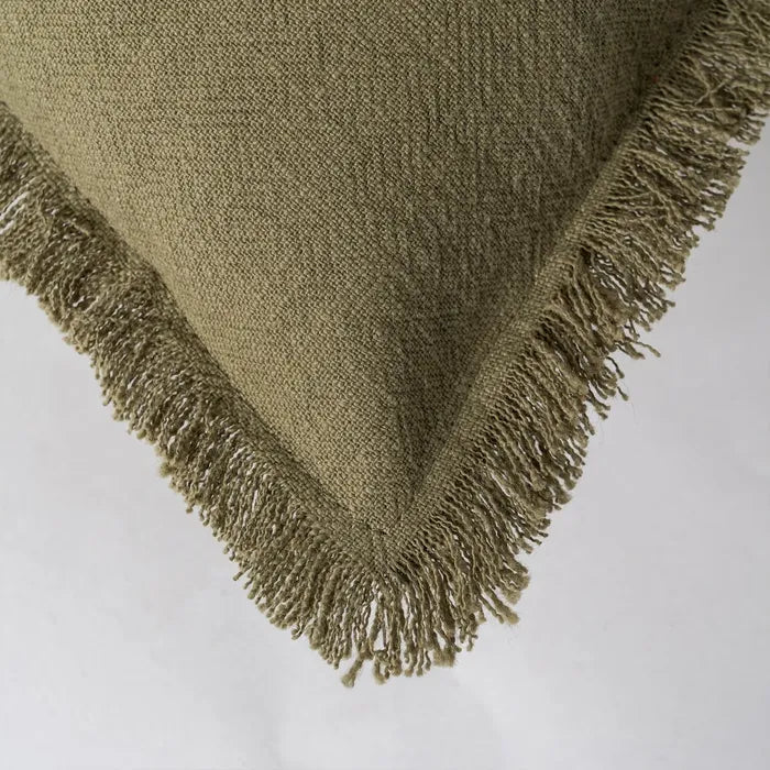 Cojín de algodón y lino en tono verde