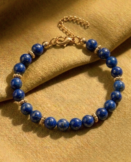 Pulsera dorada de lapislázuli 