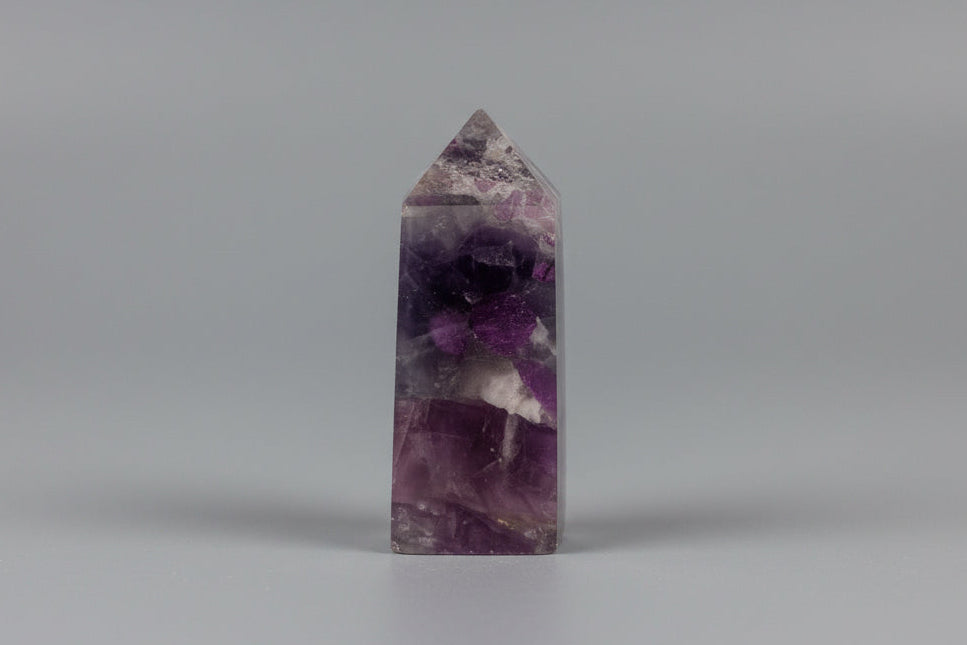 Punta generadora de turmalina rosa sobre cuarzo