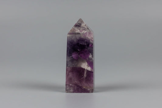 Punta generadora de turmalina rosa sobre cuarzo